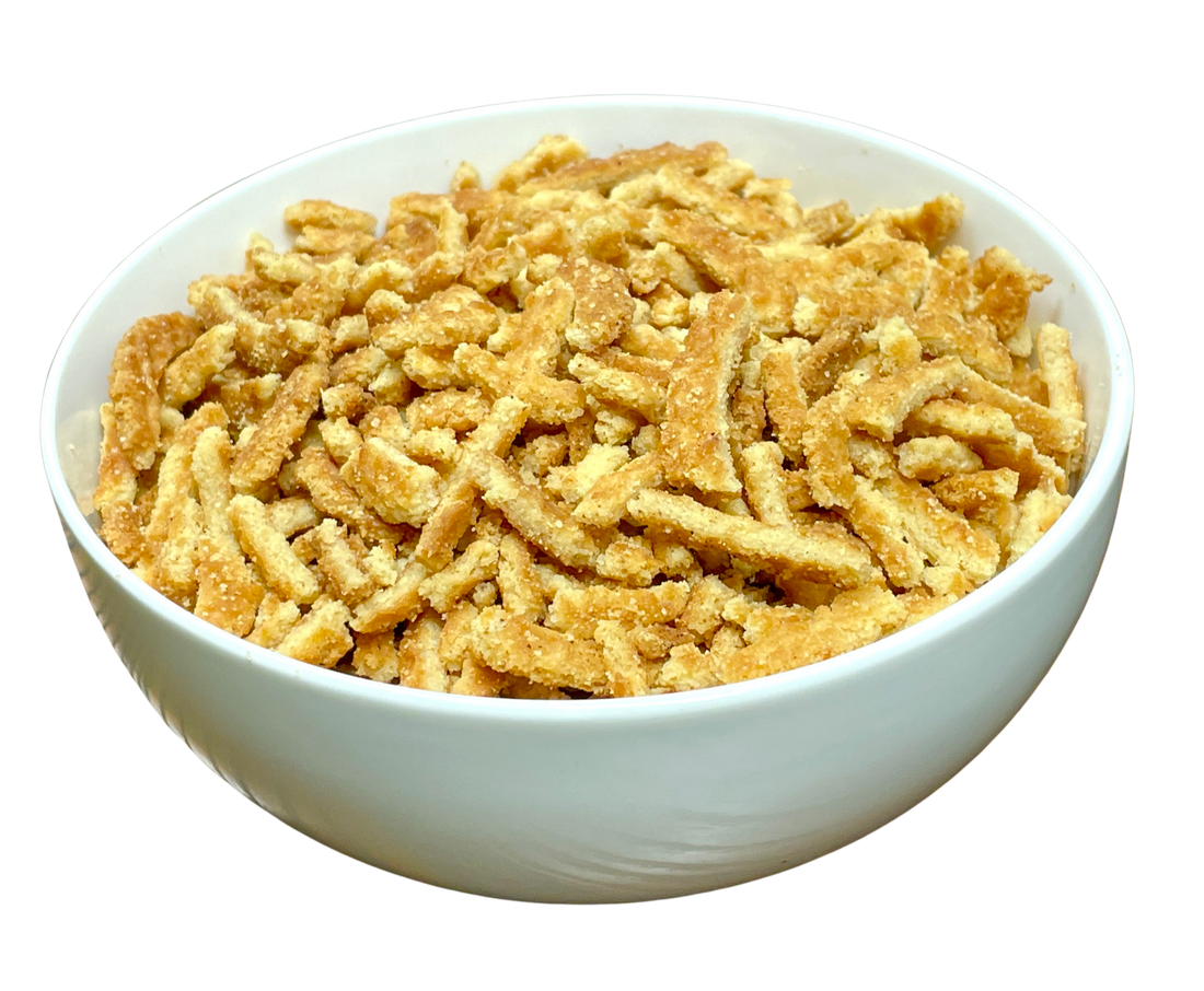 Bowl of Stroopwafel Snippers, the caramel waffle cookie pieces used as the topping for apple crisp