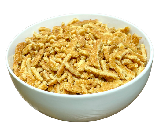 Bowl of Stroopwafel Snippers, the caramel waffle cookie pieces used as the topping for apple crisp